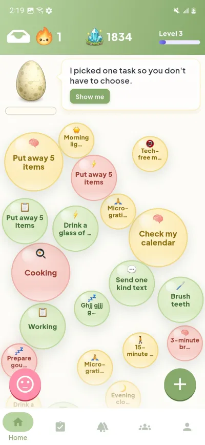 ZoBud home screen showing ADHD tasks as colorful energy bubbles sized by effort and colored by urgency